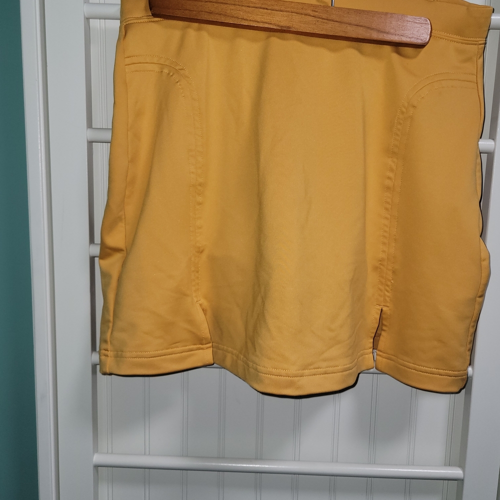 Adidas orange golf/tennis skirt size 4